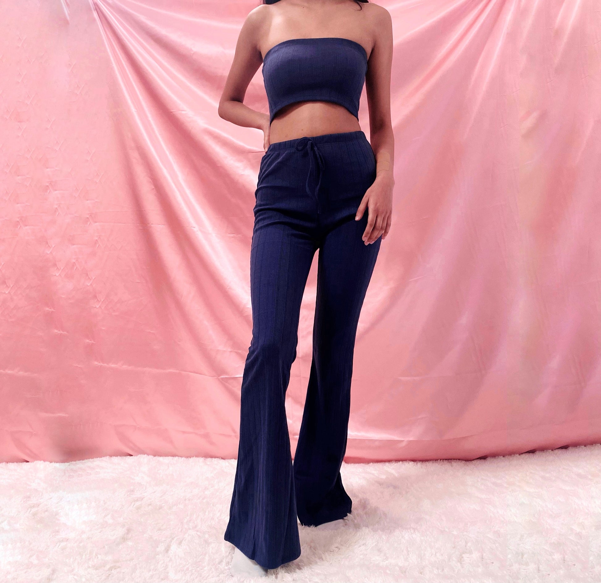 Navy Daphne 2-Piece set. Tube top and Bell Bottom Pants. Stretchy, Soft ribbed knit material. 95% Polyester 5% Spandex 